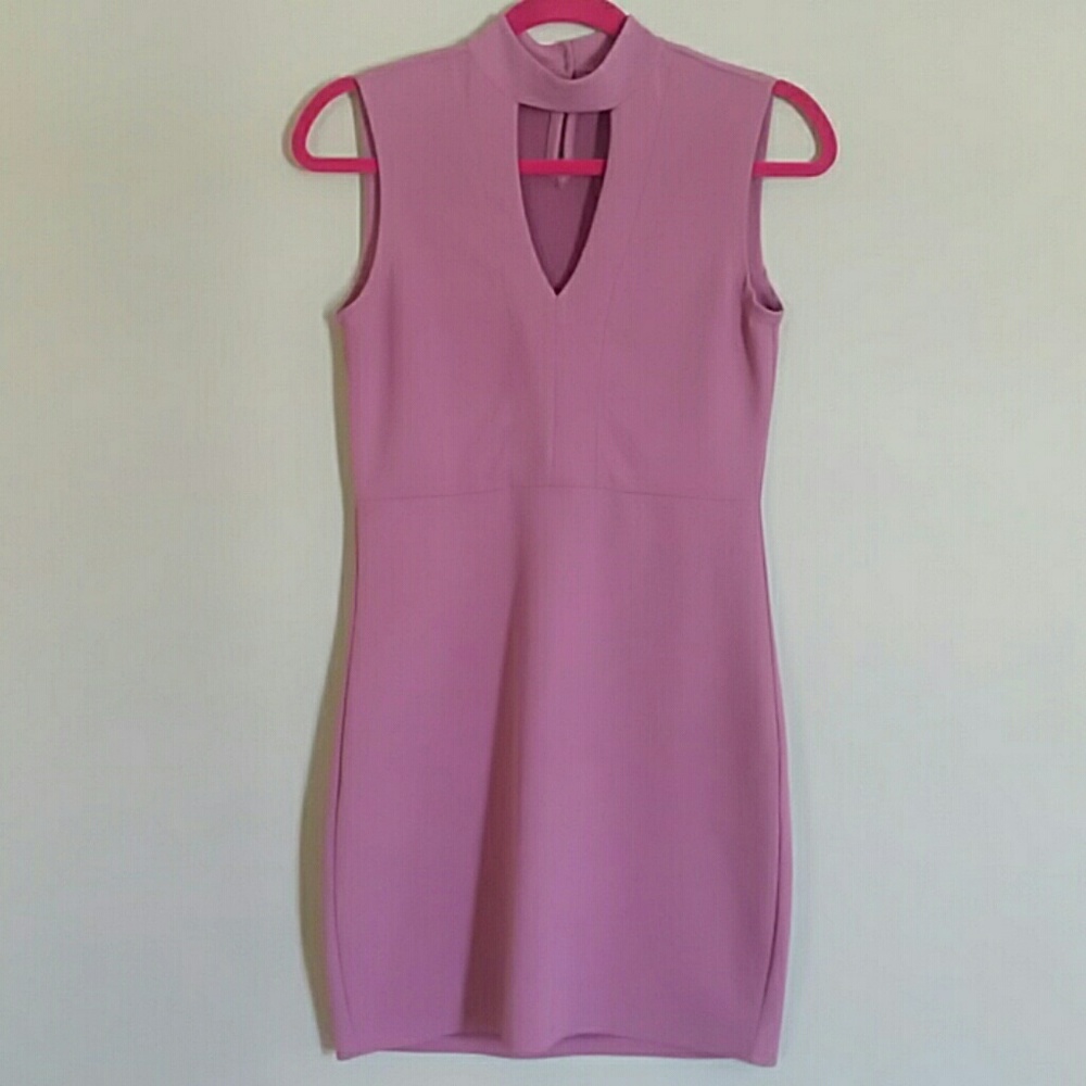 Pink Dress. Form hugging.. SZ M 7-9 Streatchy